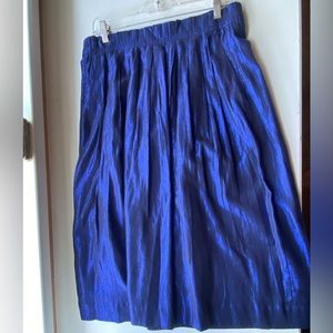 JCrew mettalic blue midi skirt. Pull on with pockets. Sz 8